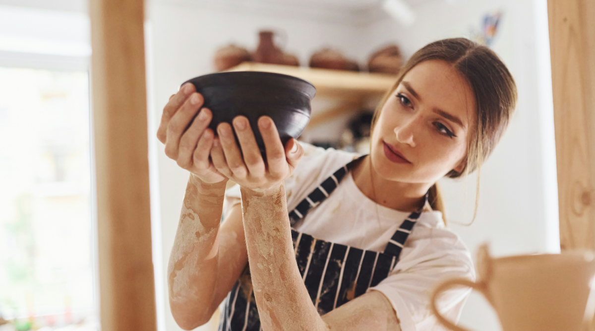 A ceramicist puts finishing touches on a bowl she will sell on Etsy. State, county, or municipal government might require a business license for your online business, even if products are sold on Etsy and nowhere else.