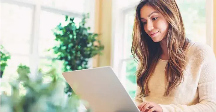 Woman working on a laptop