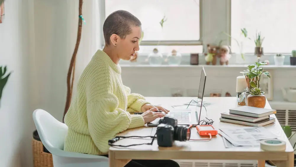 A person searches how to protect their intellectual property on a laptop