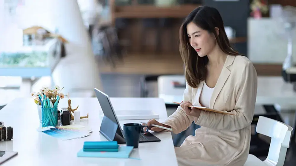 A young woman reads online about generation-skipping trusts, which transfer assets to younger generations.