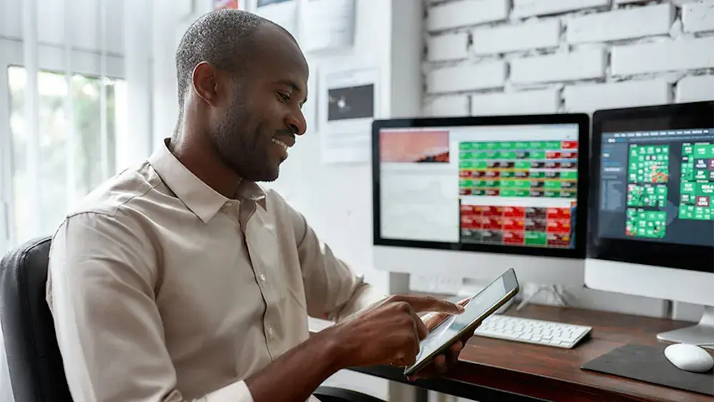 A trader checks his tablet for notification about his EIN. It takes approximately 15 minutes to process an online EIN application for a Florida LLC.