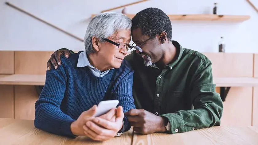 older men hugging